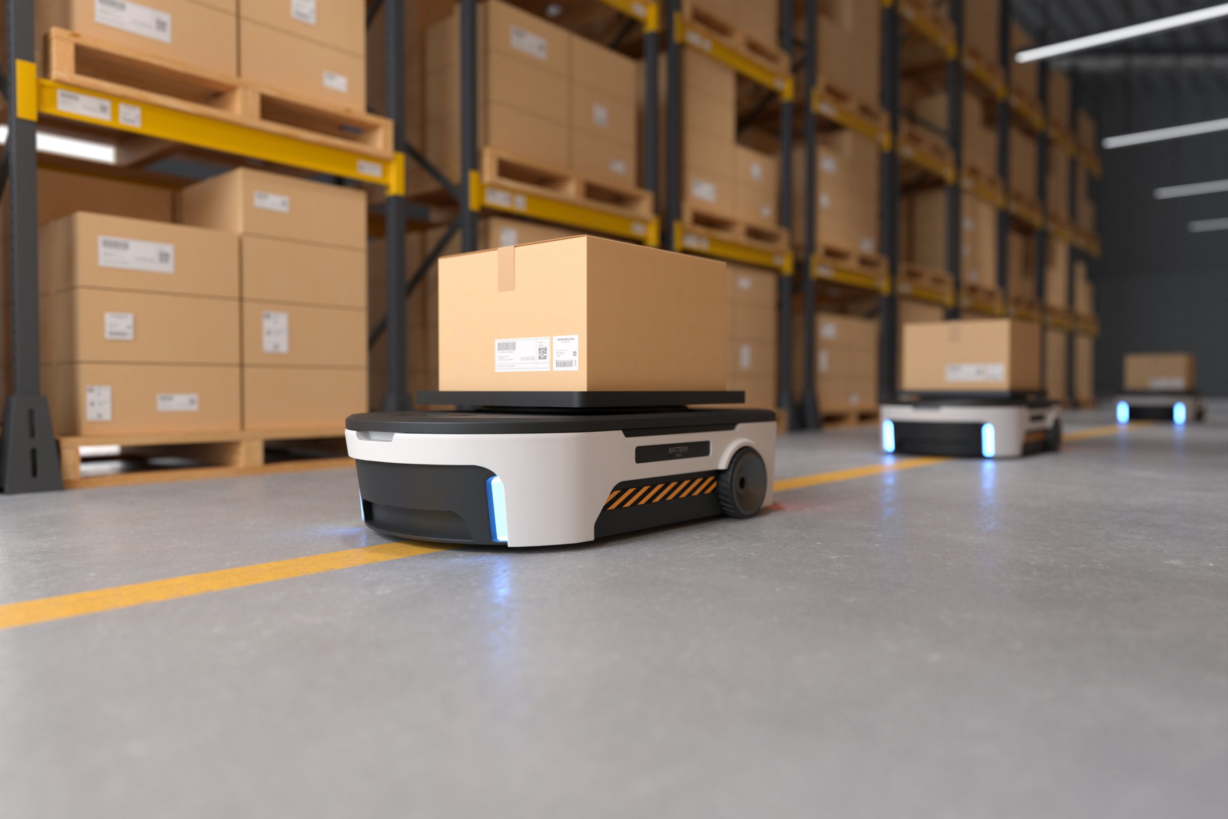 Robot transporterer pakker i et automatiseret lagersystem – en del af at automate your warehouse
